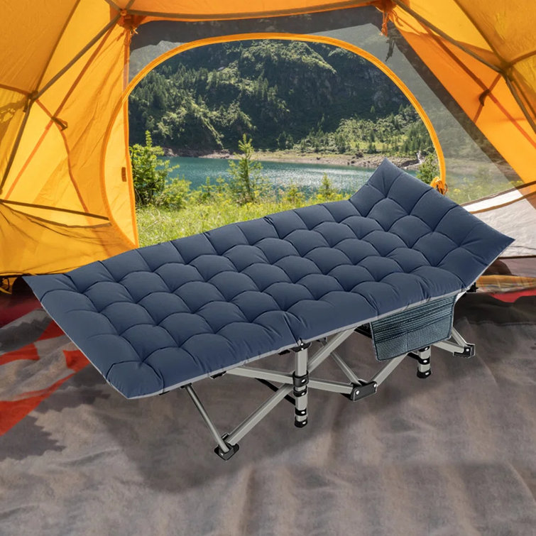 Folding camping store cot with mattress